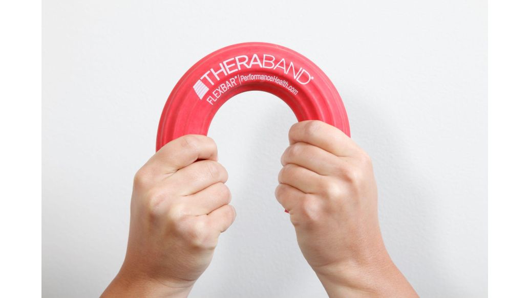 hands bending a theraband flexbar