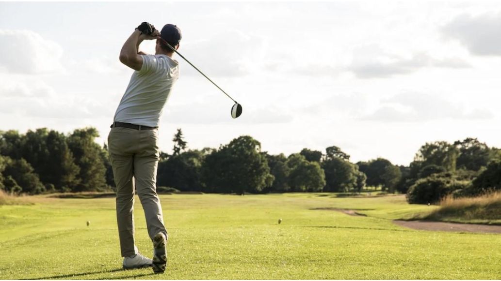 Man hitting golf swing